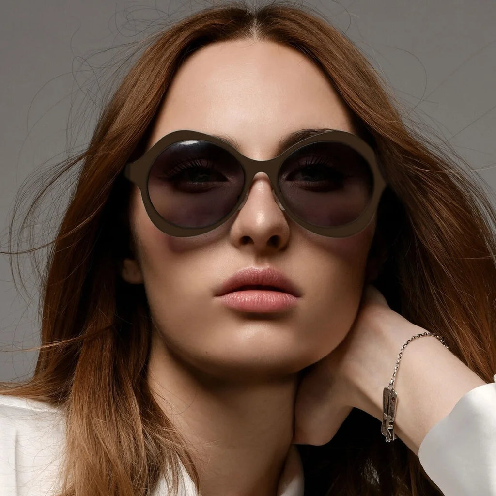 Prensil Yle Bronze con lenti da sole in nylon